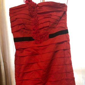 Women’s dress red shoulder strap fully lined.